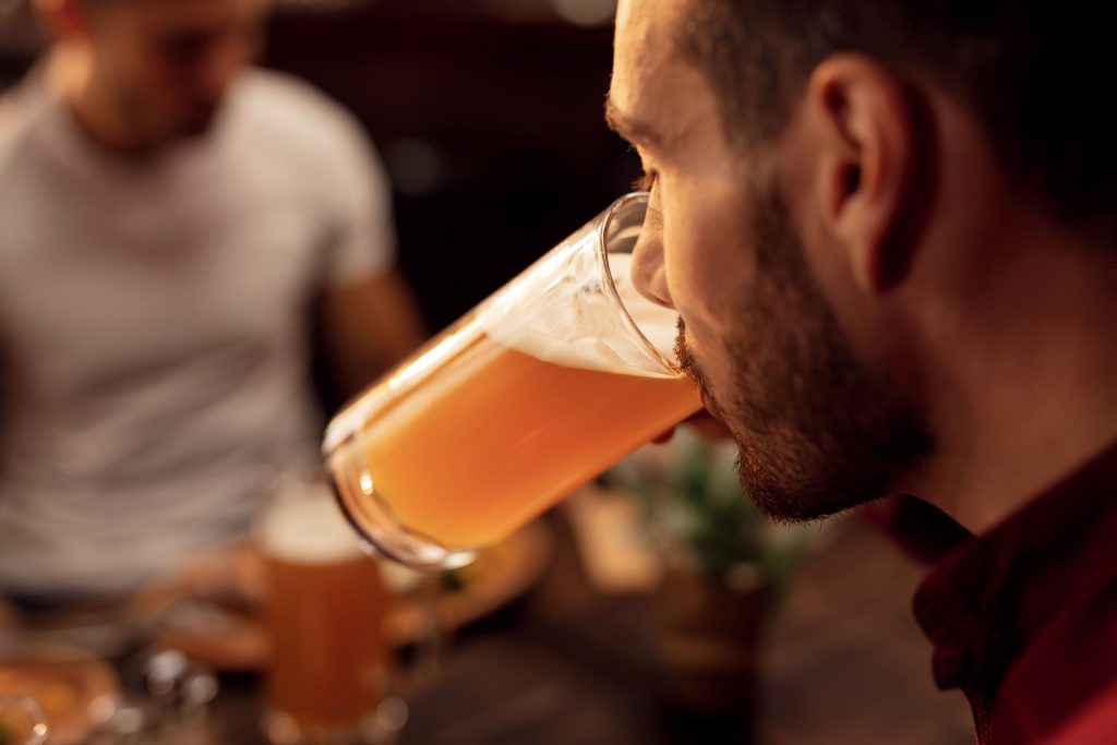 Athlete having a beer. 