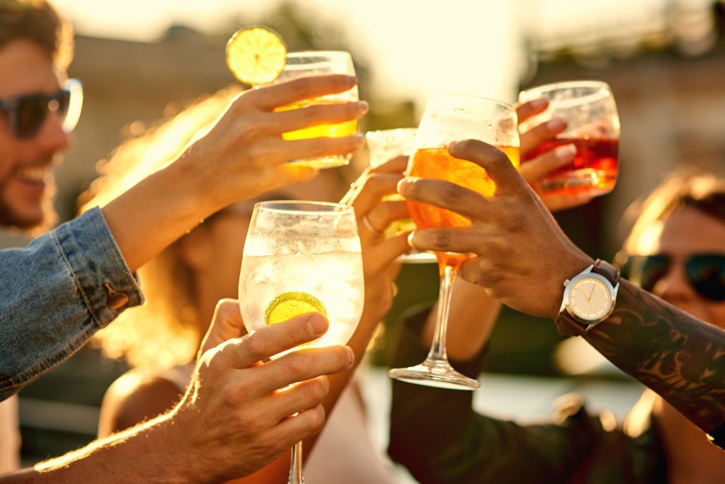 Cheers! Athletes drinking alcohol.